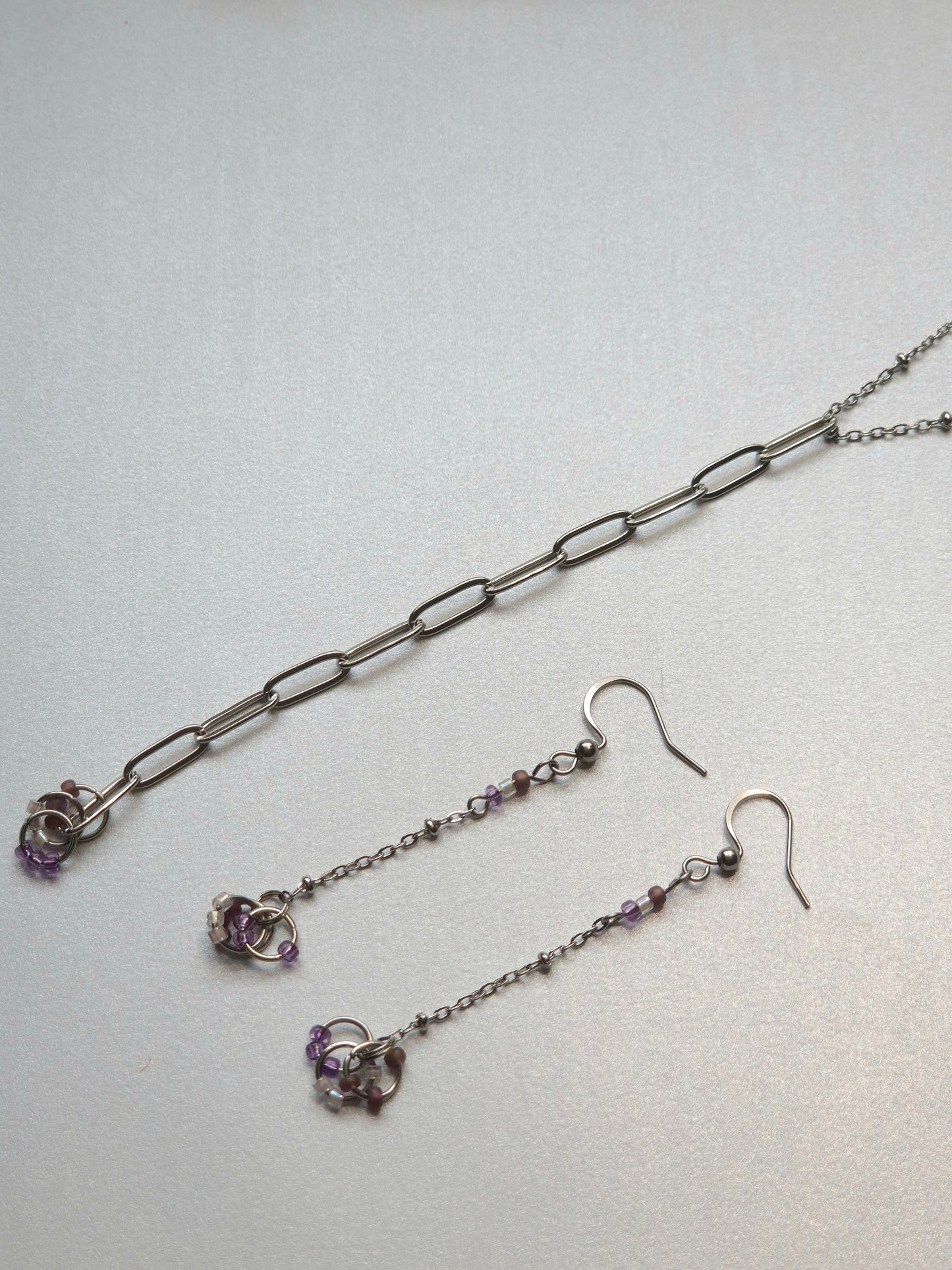 Parure minimaliste violette en acier inoxydable