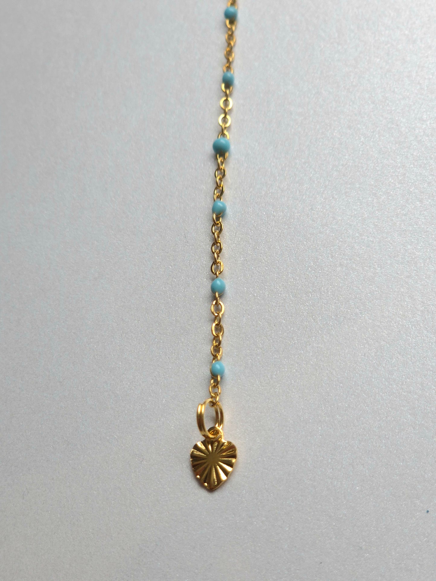 Parure dorée en acier inoxydable – Collier soleil, chaîne de dos et boucles dépareillées
