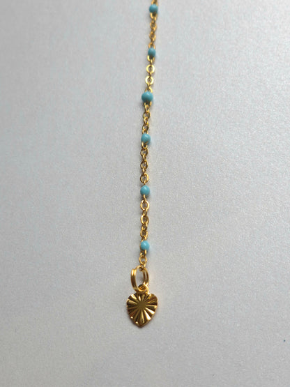 Parure dorée en acier inoxydable – Collier soleil, chaîne de dos et boucles dépareillées